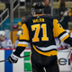 Evgeni Malkin will stay home after all.